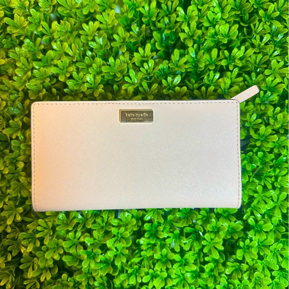 kate spade Handbags - Kate Spade Light Pink BiFold Wallet with Gold Trim